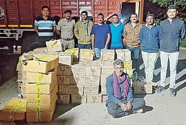 હાંસલપુર ચોકડી ઉપરથી આઇશરમાંથી રૂ. 6.50 લાખનો વિદેશી દારૂ ઝડપાયો | Foreign liquor worth Rs 6 50 lakh…